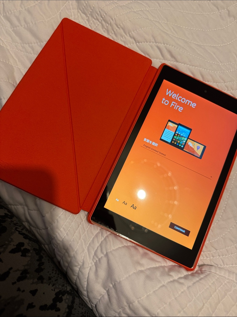Amazon Fire Tablet with orange Smart Cover
